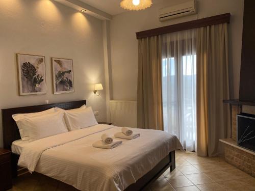 Loutraki House | Ξενώνας Ρόδον