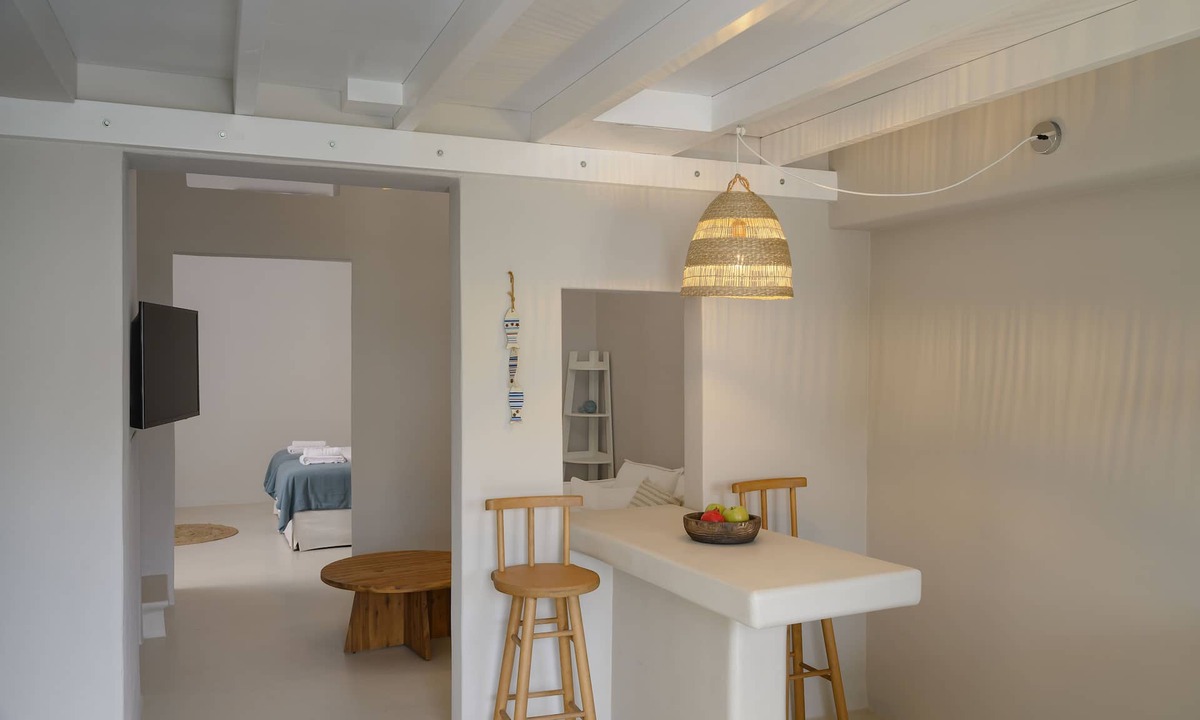 Megalochori Hotel | 2 bedroom Family Cave Suite, terrace & kitchen, by Elements Suites