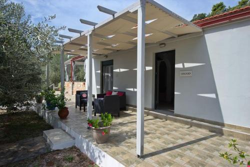 Marpounta House | Aigaio Villa Between the Aegean Blue and Olive Grove