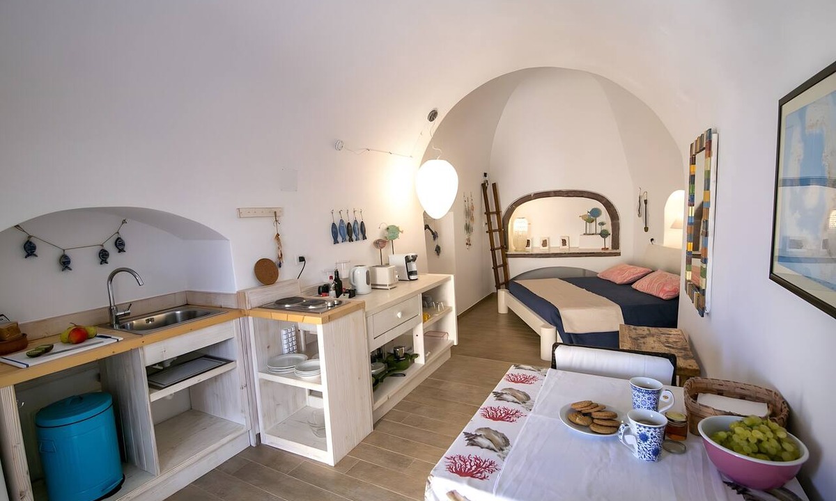 Kamari Apartment | Apartment in A Hotel 'Fireplace' with Wi-Fi and Air Conditioning