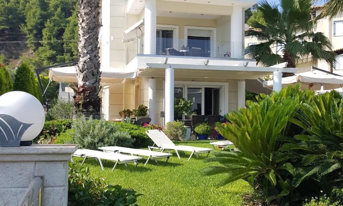 Polichrono Apartment | Holiday apartment on the second floor with a balcony and a sea view, amidst a wonderful park-like site
