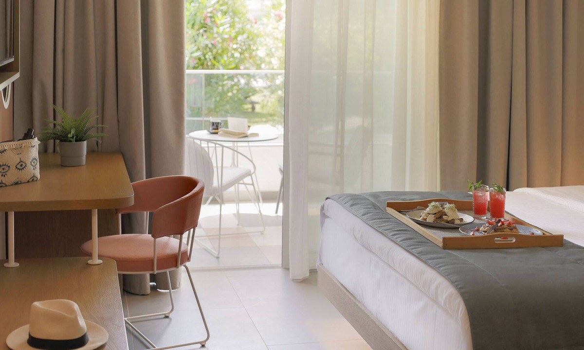 Koukounaries Hotel | Mandraki Village Boutique Hotel