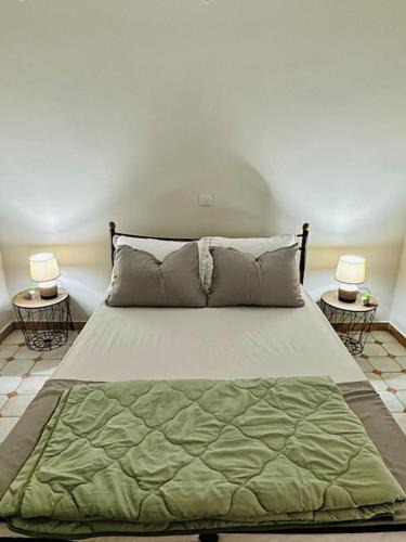 Benitses Apartment | Olive tree the master bed and balcony apartment