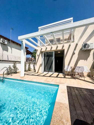 Kallikratia House | Seaside Pool Villas by BookVillaEU