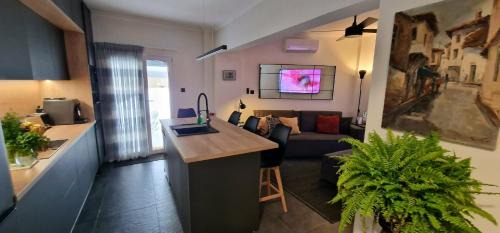 Old Town Apartment | Stylish Olive Tree Garden Apartment in Ano Poli