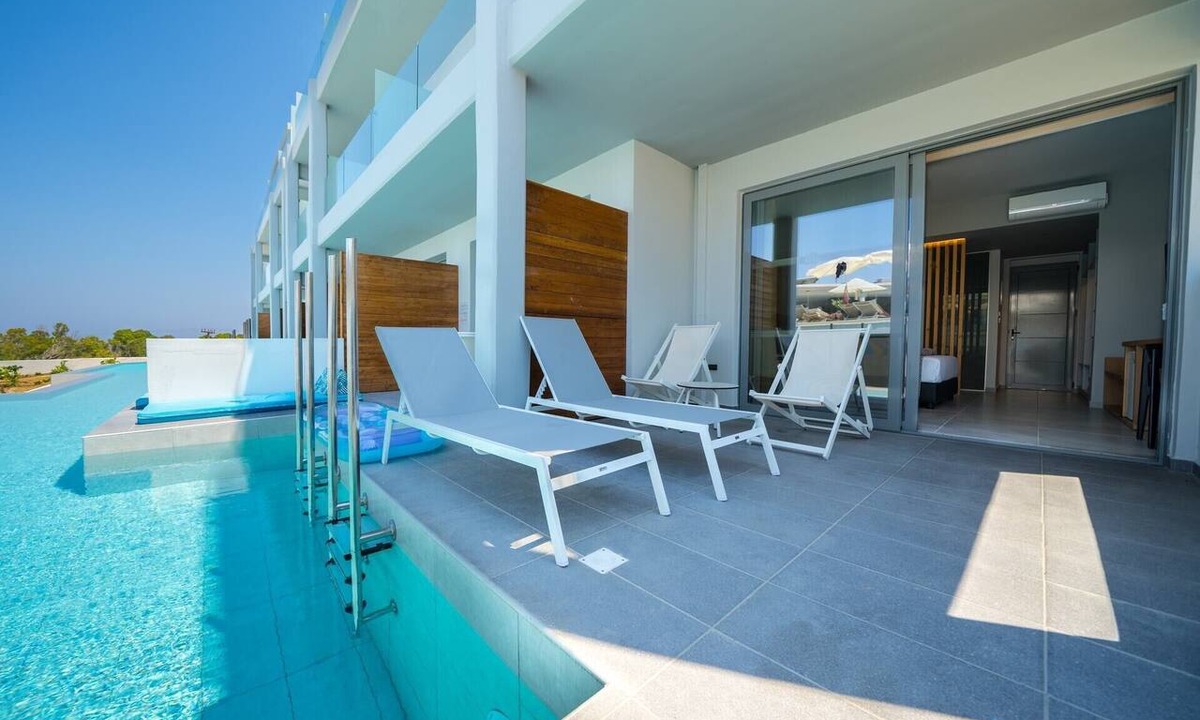 Psalidi Apartment | Superior Double Room with Swim-up Sharing Pool - Sea View