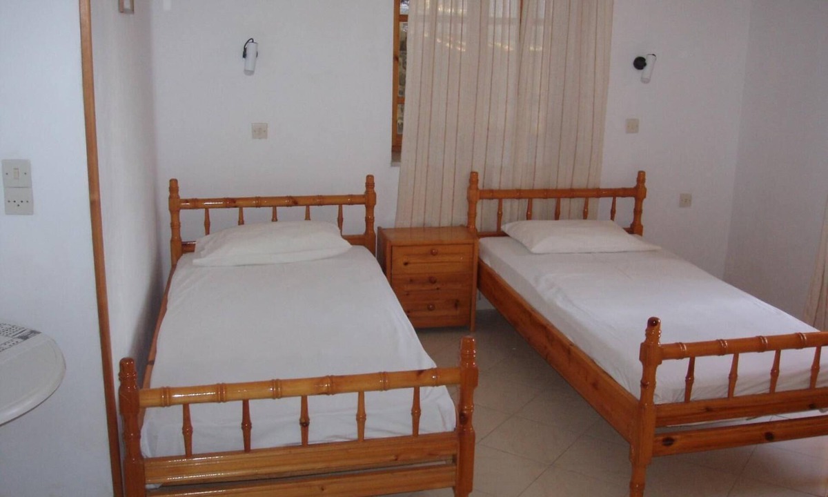 Mithimna House | The Schoolmistress With the Golden Eyes