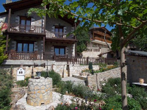 Synikia Mesi Trikalon House | Theasis suites-Ορεινή Φιλοξενία
