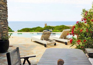 Unique stone villa with a swimming pool and sea view in Koundouros