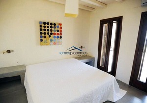 Unique stone villa with a swimming pool and sea view in Koundouros