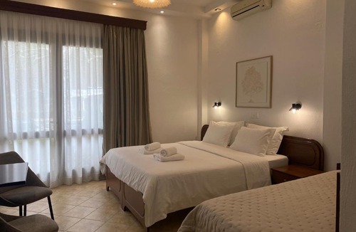 Loutraki House | Ξενώνας Ρόδον