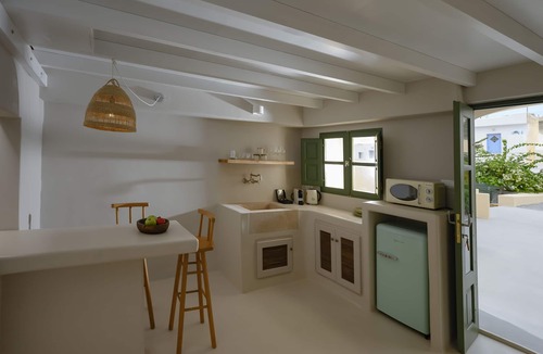 Megalochori Hotel | 2 bedroom Family Cave Suite, terrace & kitchen, by Elements Suites