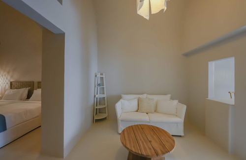 Megalochori Hotel | 2 bedroom Family Cave Suite, terrace & kitchen, by Elements Suites