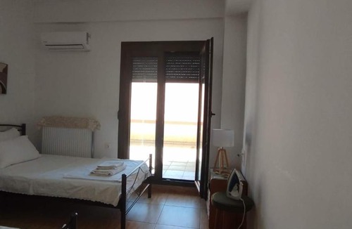 Mytilene House | Balcony Bliss Retreat- Family Friendly