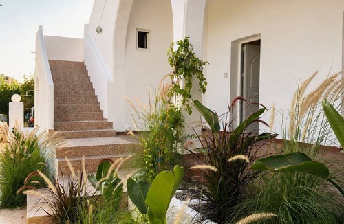 Vivari Condo | Beachfront Apartment with a View of the Garden