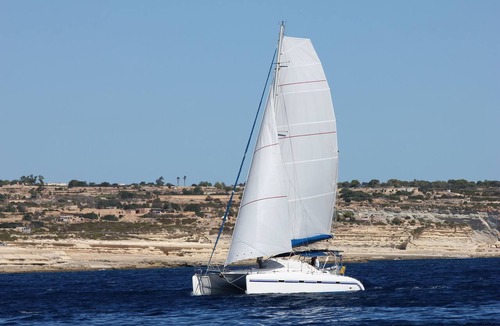Vlychada Boat Rental | Catamaran cruise with skipper and hostess