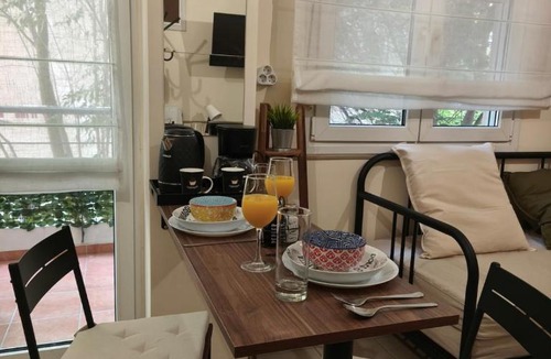 Larissa Apartment | Central Petite Hideaway with Balcony- Near Station