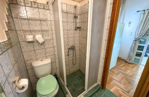 Argyroupoli Apartment | Charming Sunlit Apartment with Garden Views