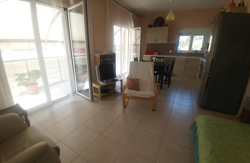 Evrostina House | Christina Apartment, a beautiful 70 m² apartment with a balcony, located 50 m from the beach