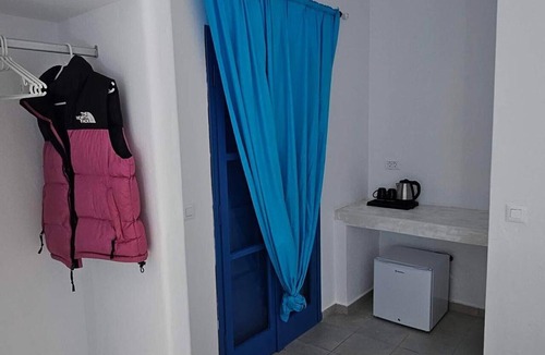 Perissa Apartment | Classic Quadruple Room 2 with Balcony and Air Conditioning