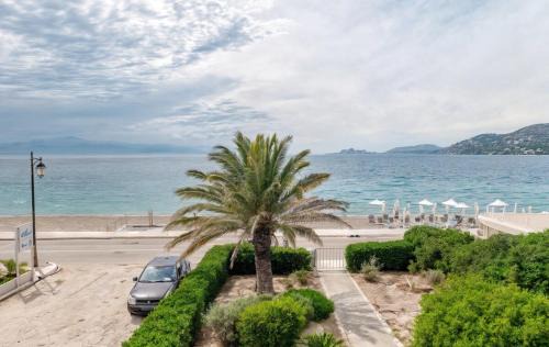 Loutraki Apartment | Front Row to the Beach - Luxury 2BR with Free Parking