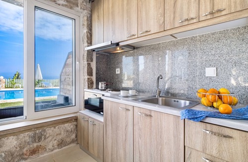 Lefkada Apartment | Gkountis Stone Apartment 3: Sea View, Shared Pool & Wi-Fi
