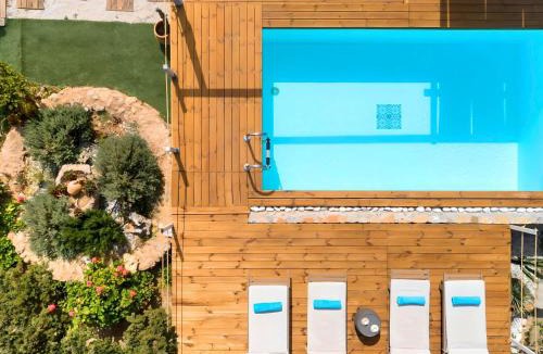 Vathi House | Holiday Home Cretan Lodge Beheizter Pool by Interhome