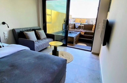 Katsarou Apartment | Luxury Suite with a queens double bed stunning sea vews and private Jacuzzi