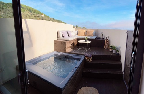 Katsarou Apartment | Luxury Suite with a queens double bed stunning sea vews and private Jacuzzi