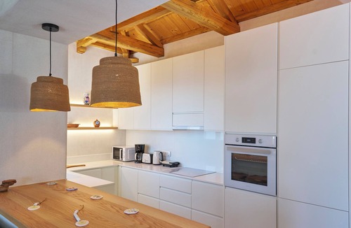 Skopelos Town Villa | Pnoé Residence is an elegant and modern home that has been fully renovated