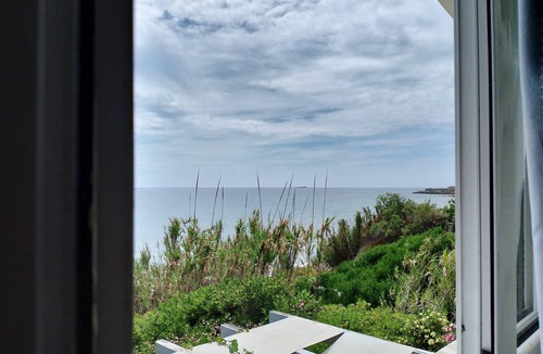 Ag. Georgios House | Seafront Loft 'Myrto' with Sea View, Private Terrace and Air Conditioning