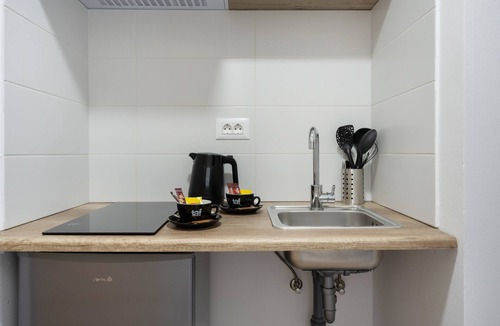 Symi Apartment | Studio '10' with Private Balcony, Kitchenette, Wi-Fi and Air Conditioning