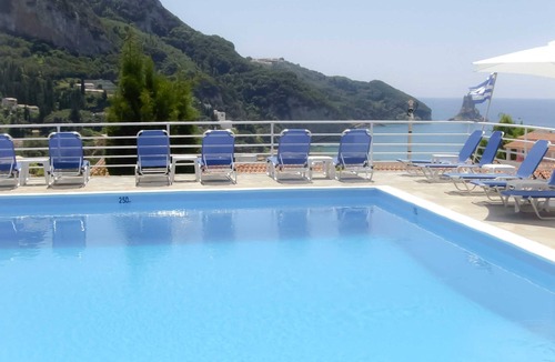 Agios Gordios Apartment | Studio with sea view, balcony, kitchenette, a/c, safe box