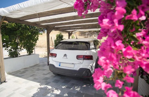 Isthmia Apartment | Sunny Home Loutraki is a modern studio with views of the bay and mountains with private parking