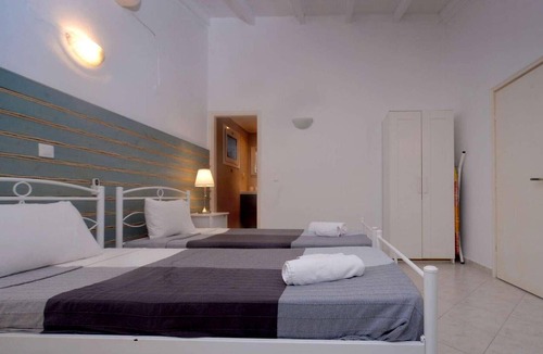 Longos House | This recently renovated beach house is located just a few steps behind Levrecchio beach and is surro