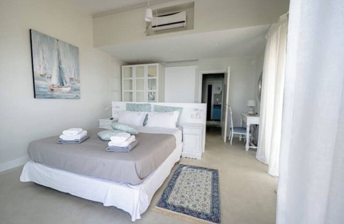 Elia Nikitis Villa | Villa Pathos: Beachfront Bliss with Pool & Panoramic Views/3 bdrs