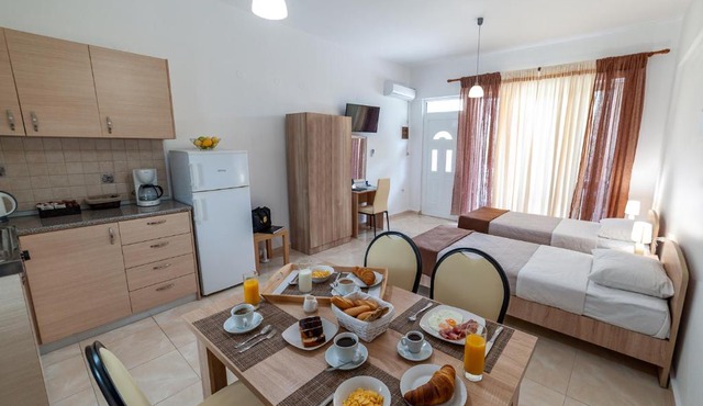 Artemis Studios - Pool and garden in Koskinou