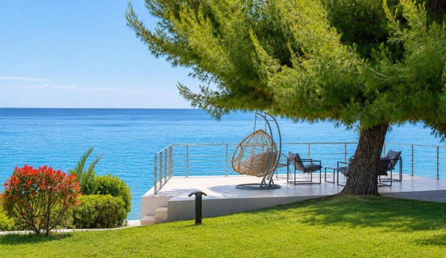 Iconic PRIVE beachfront villa Mola Kaliva in Mola Kalyva