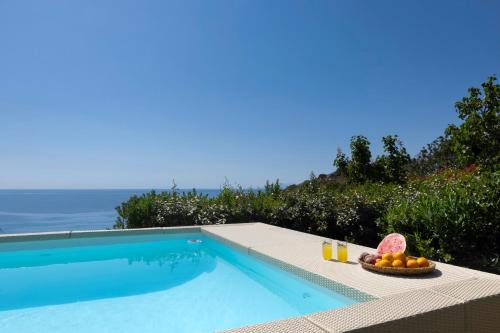 Luxury villa by the beach by Andros Villas Collection in Andros