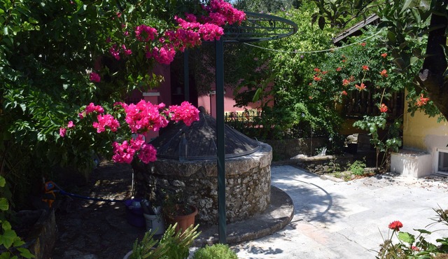 Small house with large garden in Sinarades Corfu in Sinarades