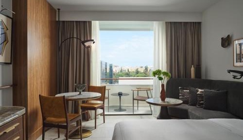 Deluxe King Room with Pool View and Balcony