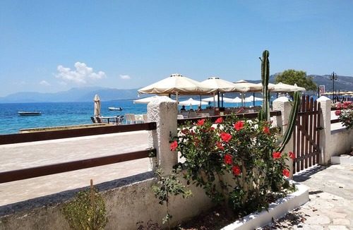 Paleros Villa | Traditional, rustic, seafront villa, just steps away from the beach.