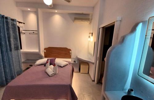 Perissa House | Evelina Pension Guest beach House-rooms and studios means vacation beside the sea-swimming in the sea-There is nothing like a morning walk on a beach-Beachlife definitely has a different vibe